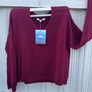 Brand new with tag, burgundy sweater, very comfortable.